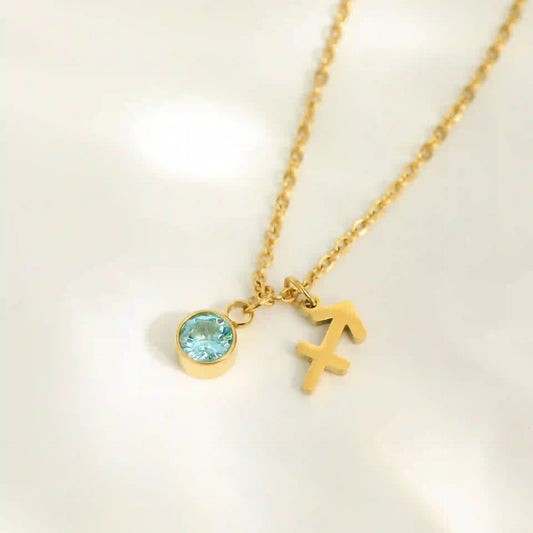 collier signe astrologique avec pierre bleue