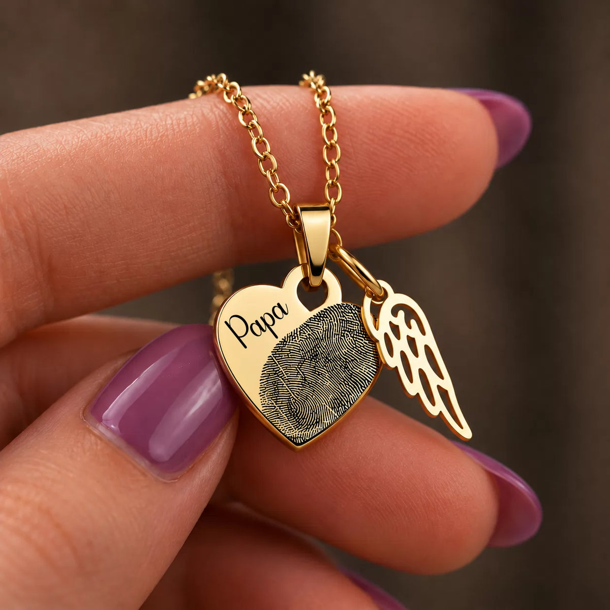 collier coeur couleur or avec gravure empreinte et breloque aile d'ange