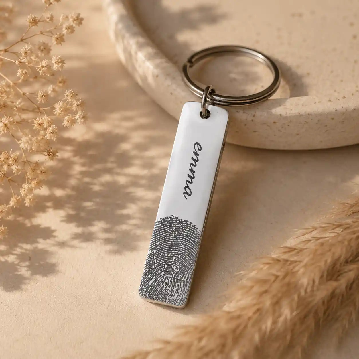 porte clé personnalisé avec empreinte et gravure texte, de couleur argent